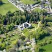 Oblique aerial view of Cawdor Castle and policies, taken from the ESE.