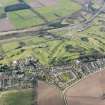 Oblique aerial view of Gleneagles golf courses, taken from the NW.