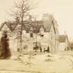 Blairgowrie, Woodside House.
View of exterior with Mrs Murray, dogs and small boy, possibly her son Edward.
Titled: 'Woodside'.

