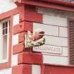 Detail of fish sculpture sign advertising the West End Cafe, 1 and 3 Gallowgate, Rothesay, Bute