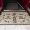 Detail of tiling at shop front entrance to 39 Victoria Street, Rothesay, Bute