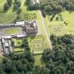 Oblique aerial view of Drumlanrig Castle and gardens, taken from the WNW.