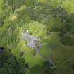 Oblique aerial view of Knocknalling House and policies, taken from the NNW.
