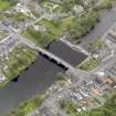 Oblique aerial view of Newton Stewart, centred on the Bridge of Cree, taken from the WNW.