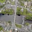 Oblique aerial view of Newton Stewart, centred on the Bridge of Cree, taken from the WSW.