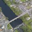 Oblique aerial view of Newton Stewart, centred on the Bridge of Cree, taken from the SSW.
