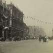Princes Street looking east from outside No 85 showing bunting for the coronation of Edward VII.  View also shows pedestrians and  horse-drawn carriages.
PHOTOGRAPH ALBUM NO 76: THE CORONATION ALBUM VOL.2