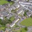Oblique aerial view of Maybole, centred on St Mary's Church, taken from the S.