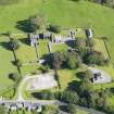 Oblique aerial view of Dundrennan Abbey, taken from the WNW.