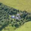 Oblique aerial view of Auchendennan Castle stables, taken from the N.