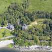 Oblique aerial view of Knockderry Castle, taken from the SW.