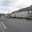 Street view showing terraced housing situated at 1-14 Baker Street, Bo'ness, taken from the North-West. This photograph was taken as part of the Bo'ness Urban Survey to illustrate the character of the Newtoun Area of Townscape Character.