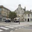 Street view looking towards Bo'ness Market Square taken from the North. The image shows 72-86 North Street and the Jubilee Fountain can be seen within the square to the right of the shot. This photograph was taken as part of the Bo'ness Urban Survey to illustrate the character of the Town Centre Area of Townscape Character.