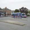 General street view showing Bo'ness bus stance and buildings on the Western side of East Pier Street, taken from the North-West. This photograph was taken as part of the Bo'ness Urban Survey to illustrate the character of the Town Centre Area of Townscape Character.