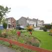 Street view showing 6-16 Willow Dell, Bo'ness, taken across the garden of 18 Willow Dell to the North-West. This photograph was taken as part of the Bo'ness Urban Survey to illustrate the character of the Kinneil Area of Townscape Character.