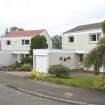 View of the detached housing arranged around a circle at Green Tree Lane, Bo'ness. This image shows Nos 53 and 55 Green Tree Lane, taken from the East. This photograph was taken as part of the Bo'ness Urban Survey to illustrate the character of the Kinneil Area of Townscape Character.