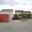 View of detached housing at 8-10 Brewlands Avenue, Bo'ness, taken looking up the hill from the South-West. This photograph was taken as part of the Bo'ness Urban Survey to illustrate the character of the Hillcrest and Brewlands Area of Townscape Character.