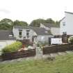 View looking towards housing at Deanburn Walk/Viewpark Road, taken from the West showing Nos 16-18. This photograph was taken as part of the Bo'ness Urban Survey to illustrate the character of the Hillcrest and Brewlands Area of Townscape Character.