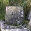 Gutterford: boundary stone in wall leading to Cock Rig summit (c NT 155 595)