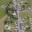 Oblique aerial view of Kirkcowan Parish Church, taken from the SSE.