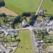 Oblique aerial view of Kirkcowan Parish Church, taken from the ENE.