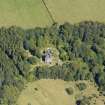 General oblique aerial view of Ravenstone Castle and policies, taken from the WSW.