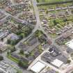 Oblique aerial view of Larbert East Church, taken from the NW.