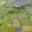 General oblique aerial view of Bannockburn, centred on Corbiewood Stadium, taken from the SE.