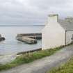 View from upper path looking across Keiss harbour and the rear of the warehouse, taken from N