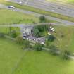 Oblique aerial view of Dinwoodie Lodge Hotel, taken from the NE.