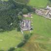 Oblique aerial view of Halleaths Stables, taken from the NE.