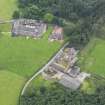 Oblique aerial view of Halleaths Stables, taken from the NW.