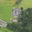 Oblique aerial view of Halleaths Stables, taken from the SW.