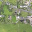 Oblique aerial view of Dornock Parish Church, taken from the SSE.