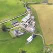 Oblique aerial view of Milnholm Farmhouse, taken from the ESE.