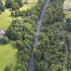 General oblique aerial view of Langholm Lodge Duchess Bridge, taken from the WNW.