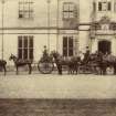 View of three horse-drawn carriages outside St Fort House.