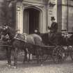 View of driver and carriage with two horses outside St Fort House.