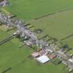 General oblique aerial view of Ruthwell, taken from the SE.