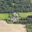 Oblique aerial view of Arbigland House and stables, taken from the NW.