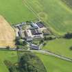 Oblique aerial view of Southwick House Home Farm, taken from the NNW.