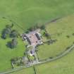 Oblique aerial view of Terregles House stables, taken from the NW.