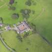Oblique aerial view of Terregles House stables, taken from the SW.