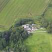 Oblique aerial view of Carnasalloch House stables and cottage, taken from the SSE.