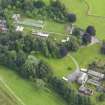 Oblique aerial view of Carnsalloch House and walled garden, taken from the NW.