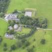 Oblique aerial view of Tinwald House and policies, taken from the SE.