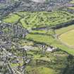 General oblique aerial view of Stirling Castle and Stirling Golf Course, taken from the NNE.