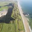 General oblique aerial view of Spey Bay Golf Course looking along the beach, taken from the ESE.