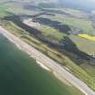 General oblique aerial view of Spey Bay Golf Course, taken from the NW.