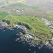 General oblique aerial view of Royal Tarlair Golf Course, taken from the WNW.